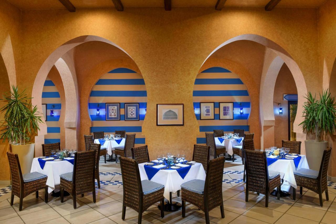 Jaz Belvedere Resort Sarm es-Sejk Kültér fotó Restaurant at the hotel