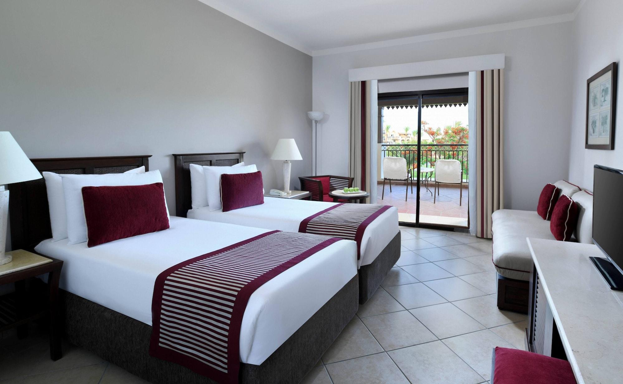 Jaz Belvedere Resort Sarm es-Sejk Kültér fotó A room at the Hilton Sharm El Sheikh
